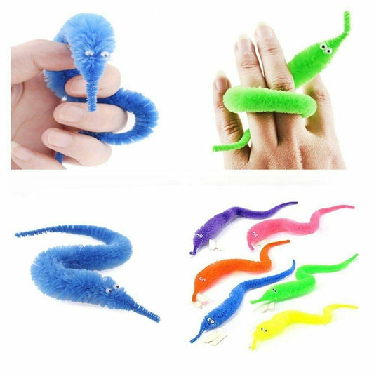 Magician performing tricks with a fuzzy squirmle worm.