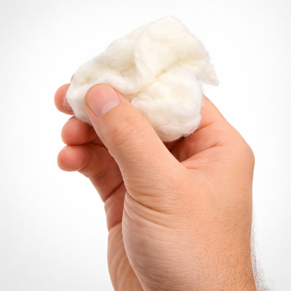 A bright burst of fire created by flash cotton during a magic trick.