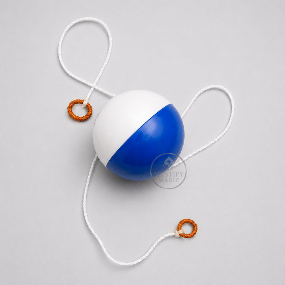 Obedient Ball magic trick stopping mid-air on a string.