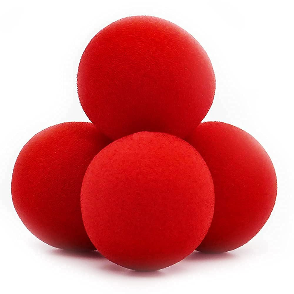 Set of four 4.5 cm super soft yellow sponge balls for magic tricks.